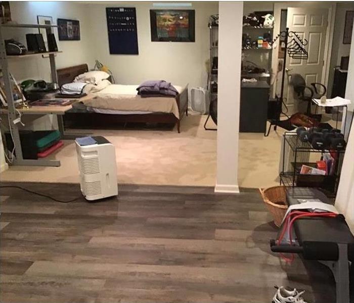 A bedroom looking clean after repairs