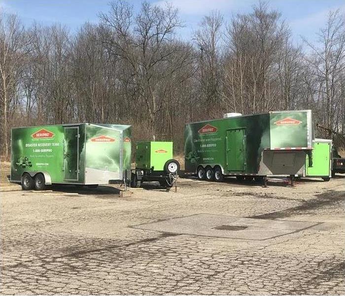 Two SERVPRO Trailers in a parking lot